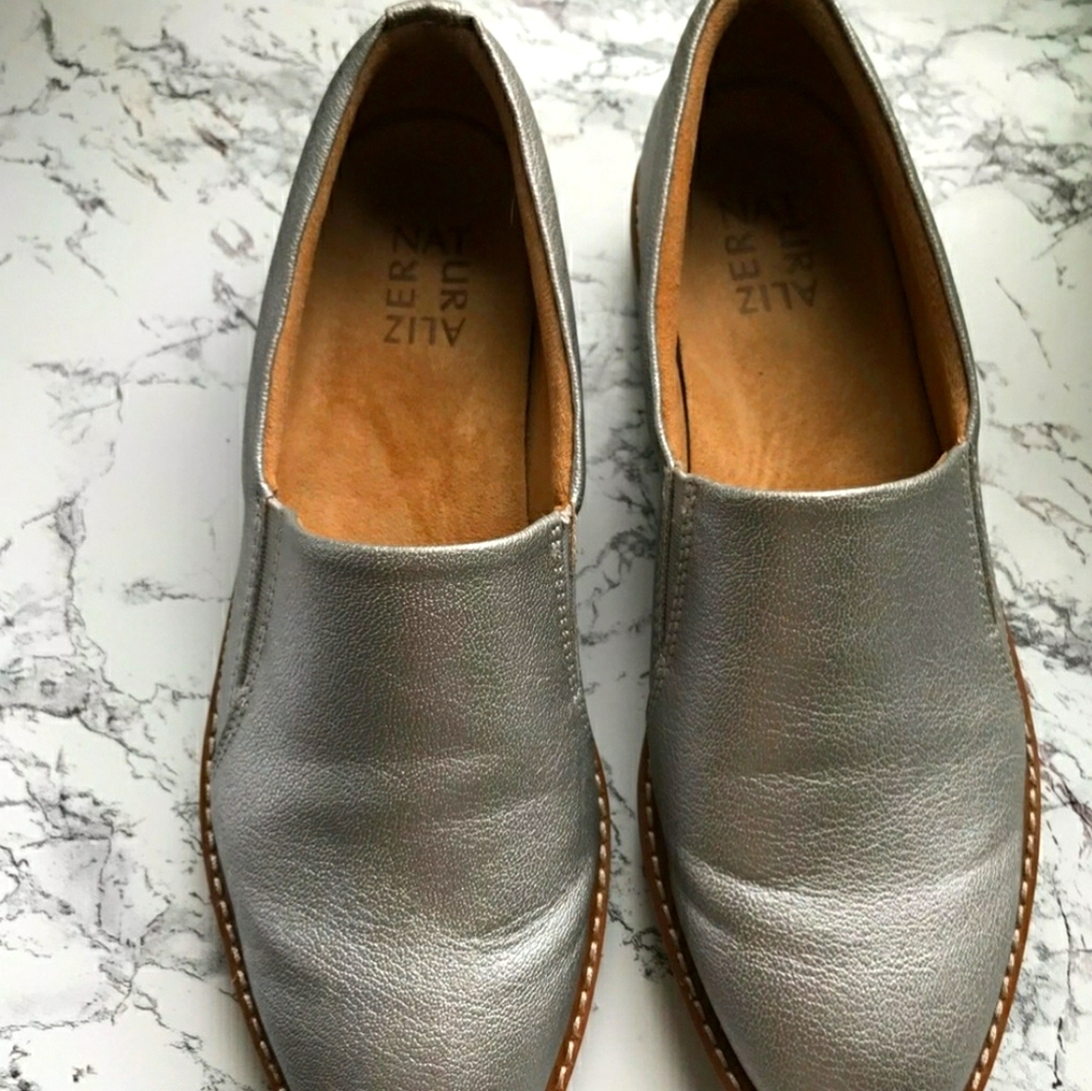 Naturalized silver grey slip ons. Size 8.5